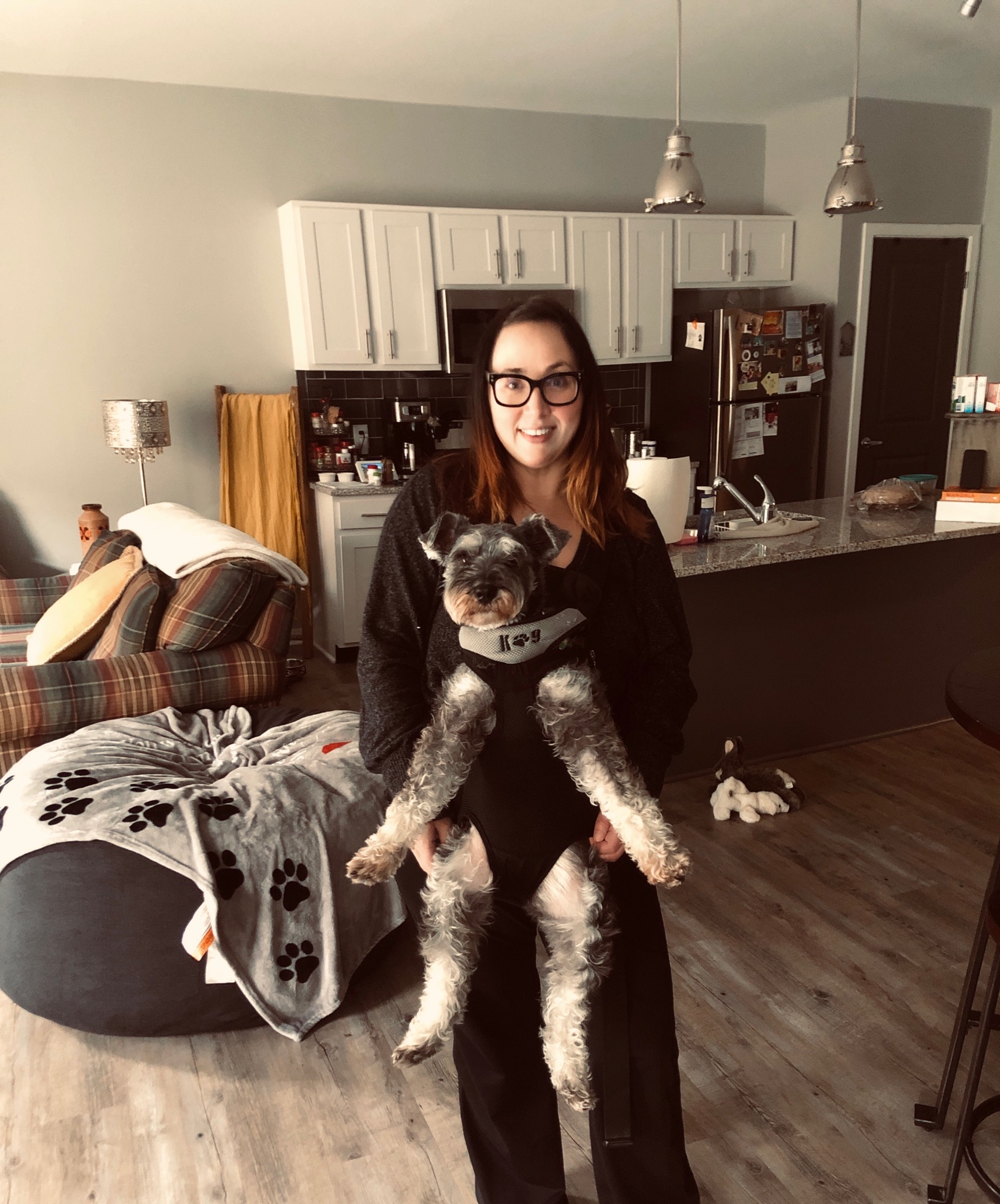 The founder holding Blitz at home